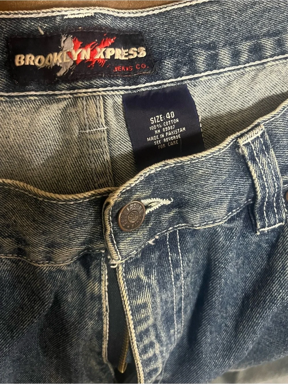 Men's Distressed Blue Jeans with Patch Detail